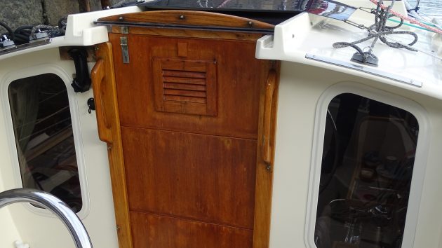 Pippin's original companionway was made of three heavy wooden washboards. Credit: John Willis