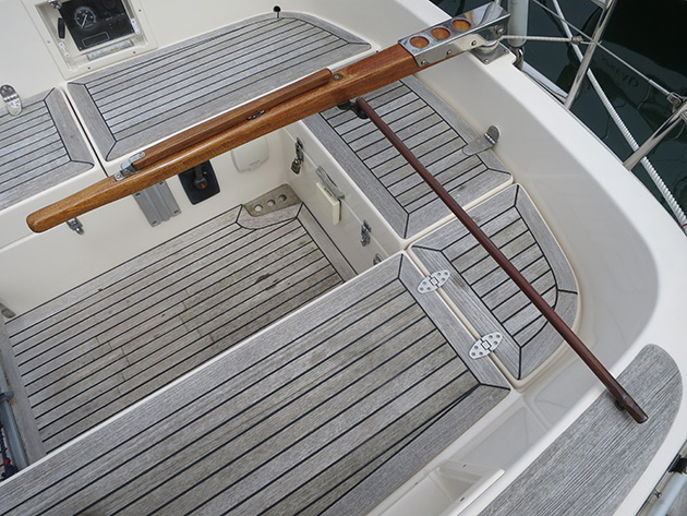 A rod being used for tiller steering on a boat